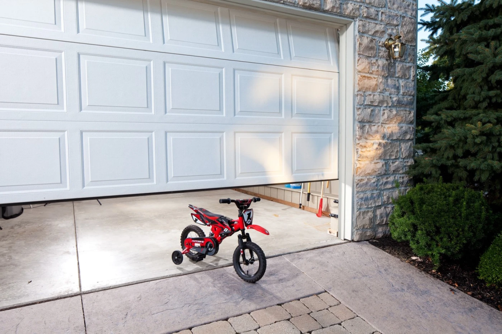 Garage door with safety sensors installed at the base, ensuring safe operation