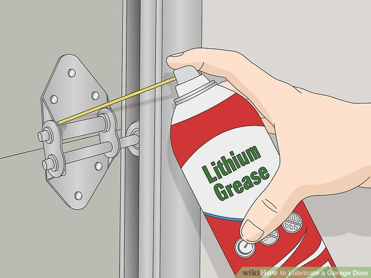 Applying lubricant to a garage door's roller mechanism in Vancouver